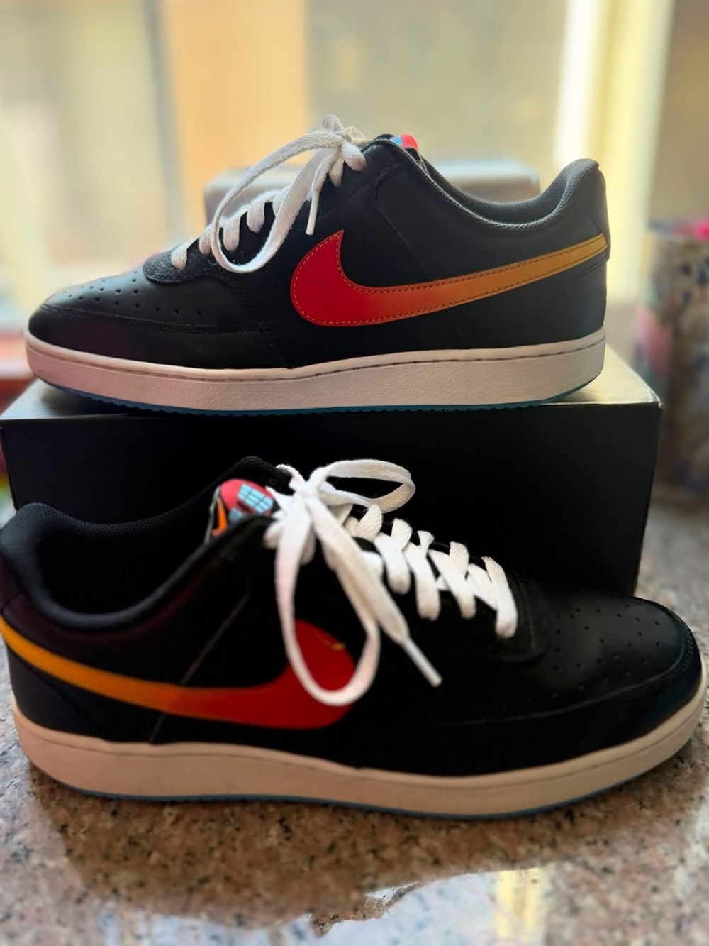 Nike Men's Black Sneakers with Red-to-Orange Gradient Swoosh